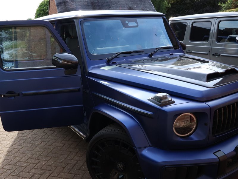 Blue Mercedes-AMG G63 after a ceramic coating applied at the customer's home